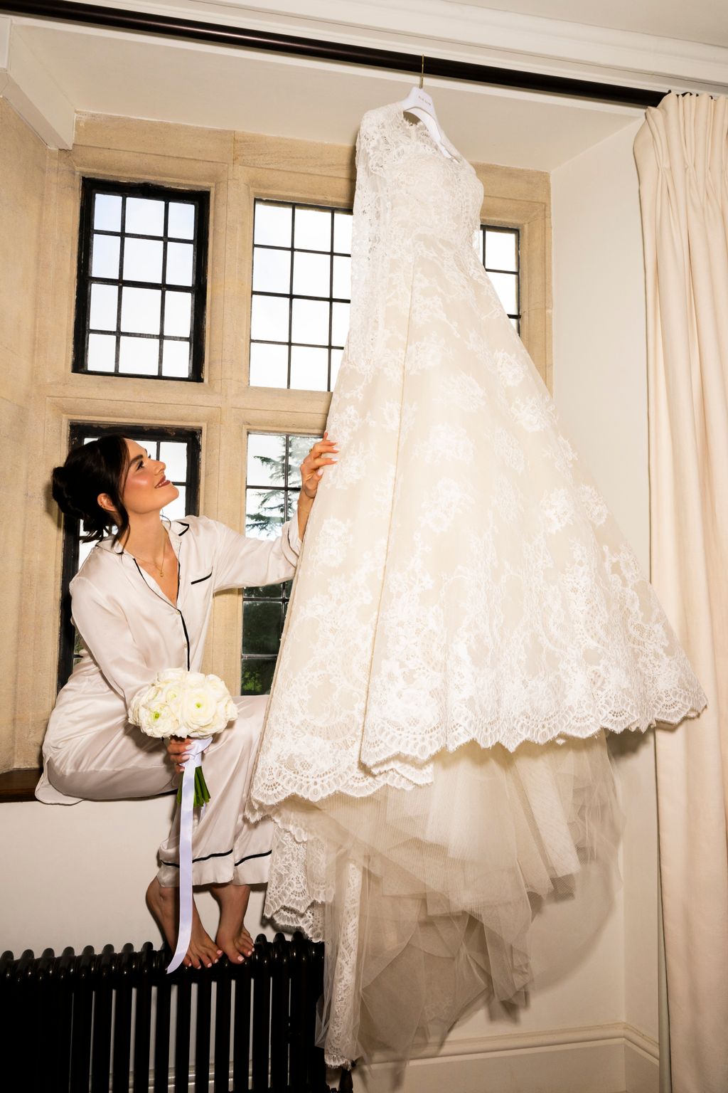 Image may contain Clothing Dress Fashion Formal Wear Gown Wedding Wedding Gown Adult and Person