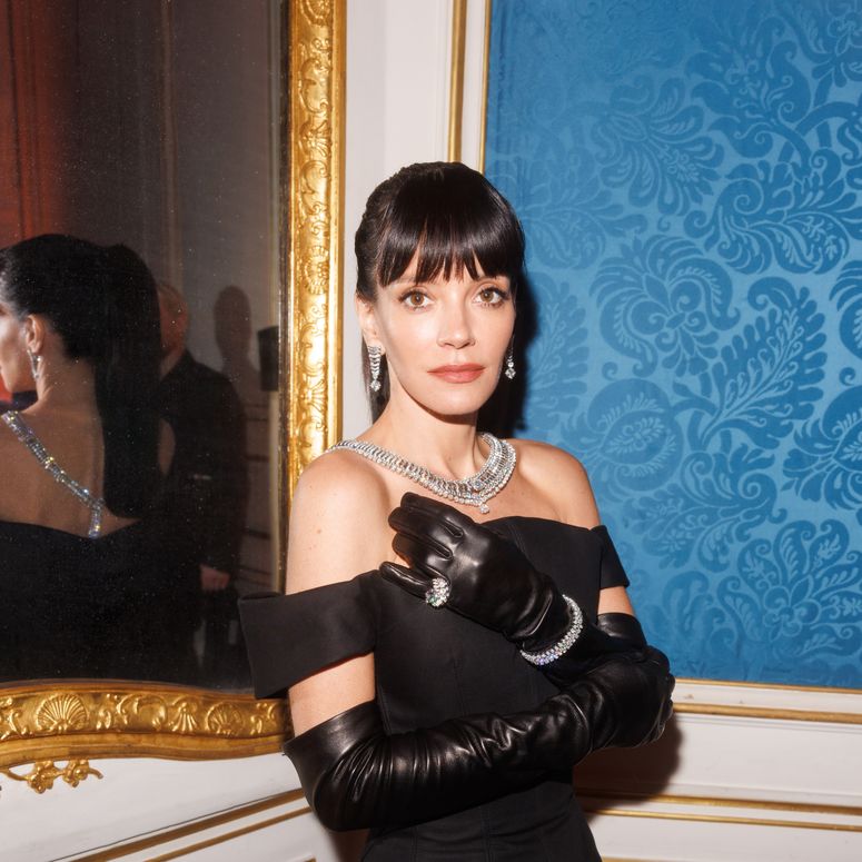 Image may contain: Lily Allen, Clothing, Glove, Person, Adult, Face, Head, Photography, Portrait, Dress, and Accessories