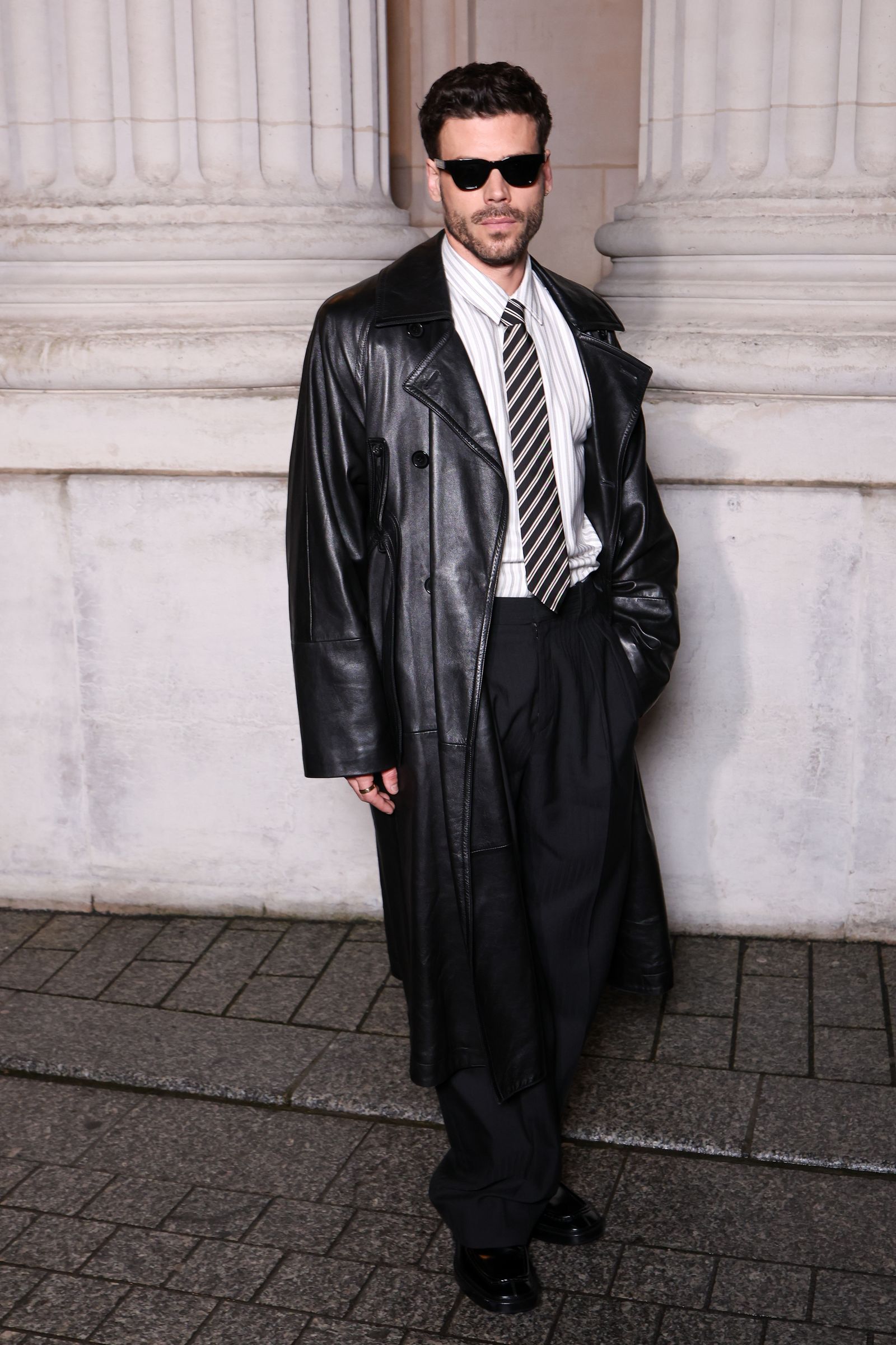 Image may contain François Arnaud Clothing Coat Jacket Adult Person Accessories Formal Wear Tie and Overcoat