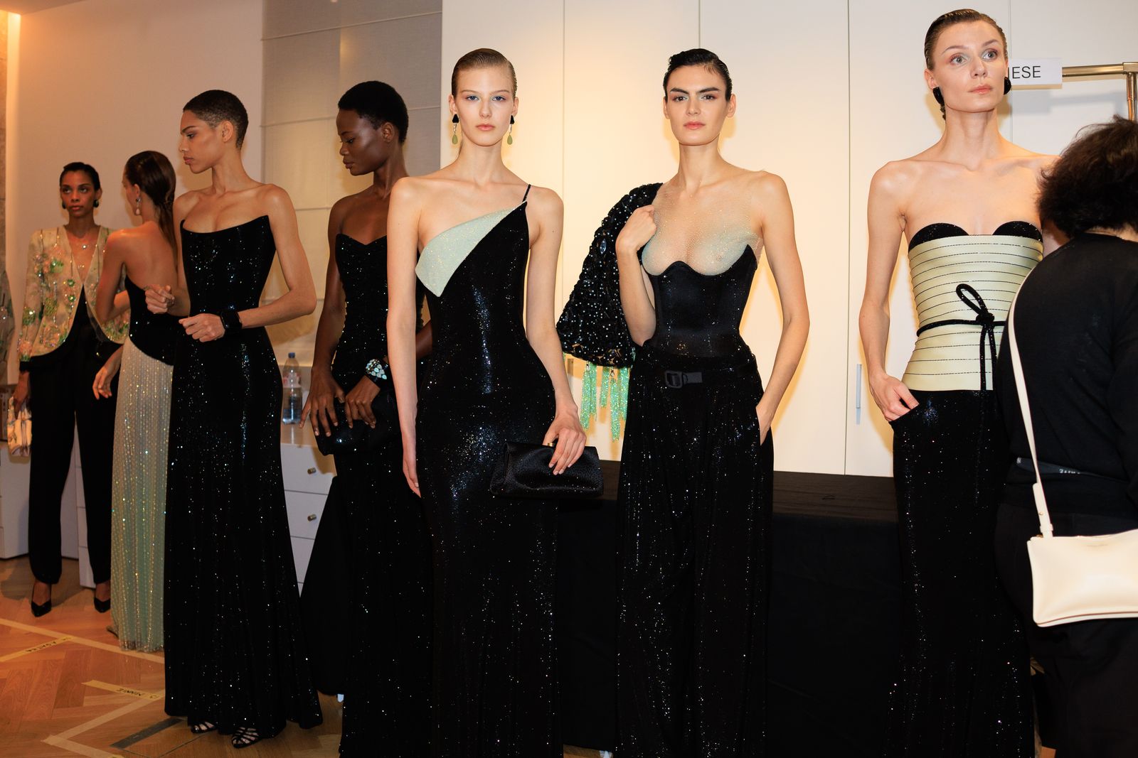 Image may contain Elyse Sewell Muriel HurtisHouairi Clothing Dress Evening Dress Formal Wear Adult and Person