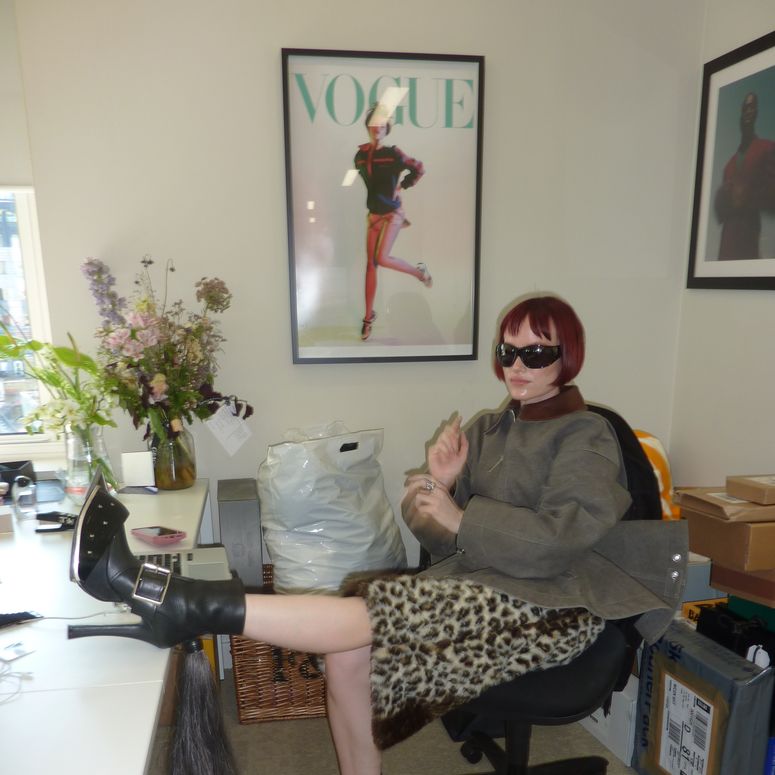 Image may contain: Plant, Potted Plant, Face, Head, Person, Photography, Portrait, Clothing, Footwear, Shoe, and Art