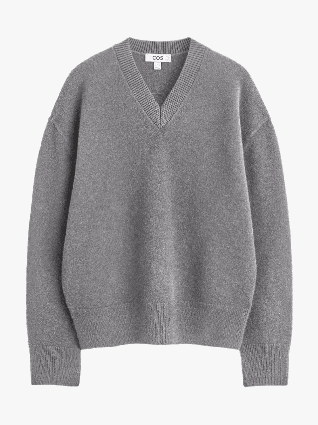 Image may contain: Clothing, Knitwear, Sweater, and Sweatshirt