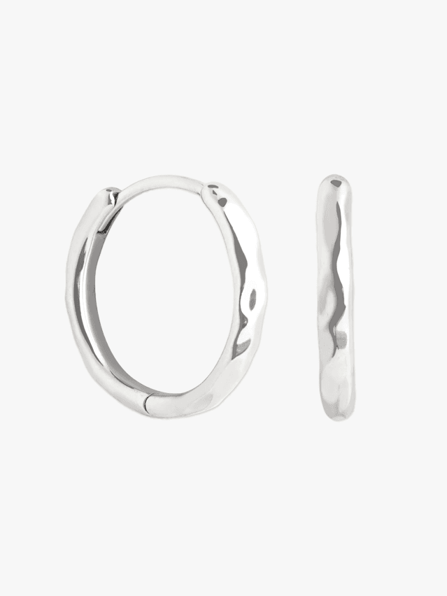 Image may contain: Silver, Accessories, Diamond, Gemstone, Jewelry, Platinum, Cuff, and Smoke Pipe