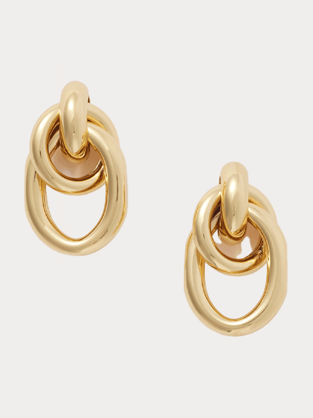 Image may contain Accessories Earring Jewelry Gold and Smoke Pipe