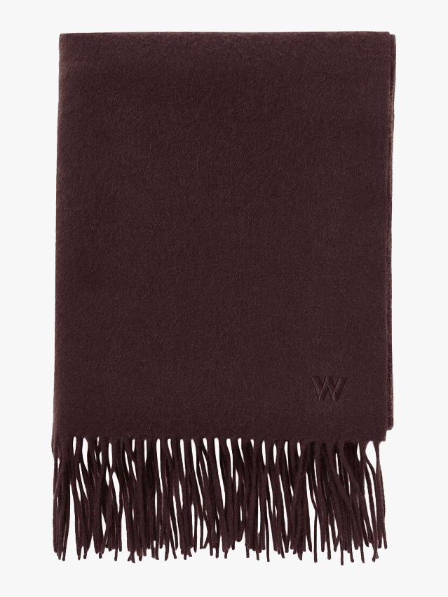 Image may contain Home Decor Blanket Accessories Bag and Handbag