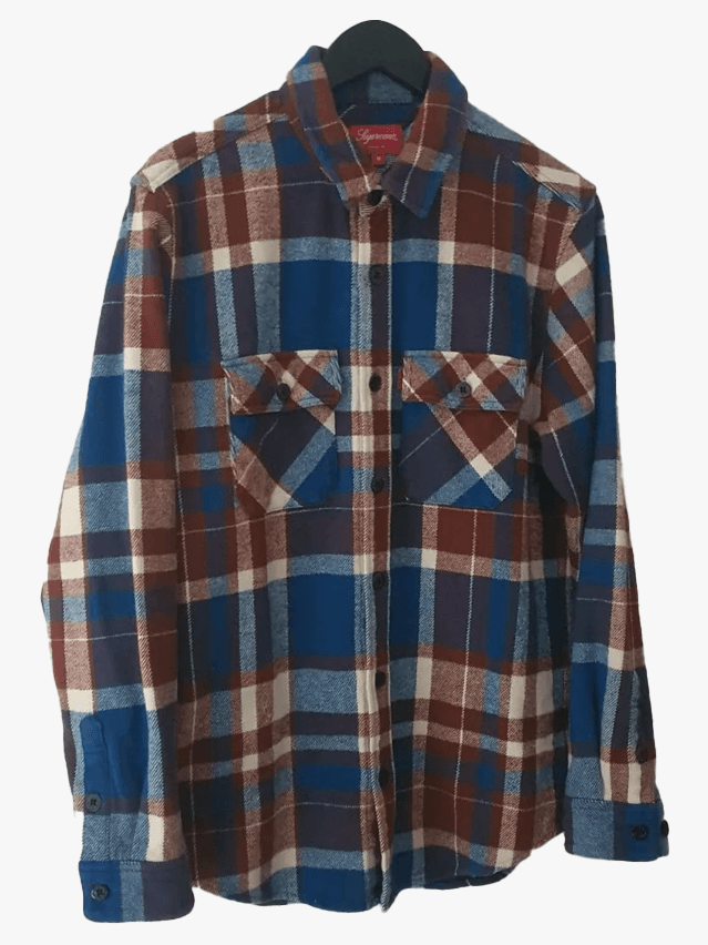 Image may contain Clothing Shirt Dress Shirt Coat Long Sleeve and Sleeve