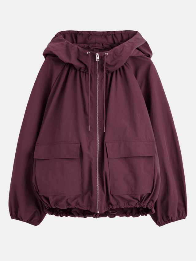 Image may contain Clothing Coat Jacket Hoodie Knitwear Sweater Sweatshirt and Hood